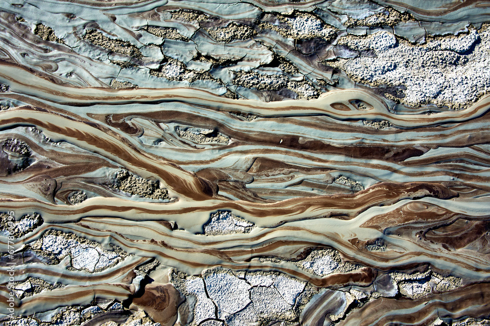 cones of mud volcanoes from which rivers of mud flow