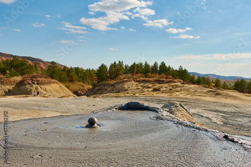 cones of mud volcanoes from which rivers of mud flow