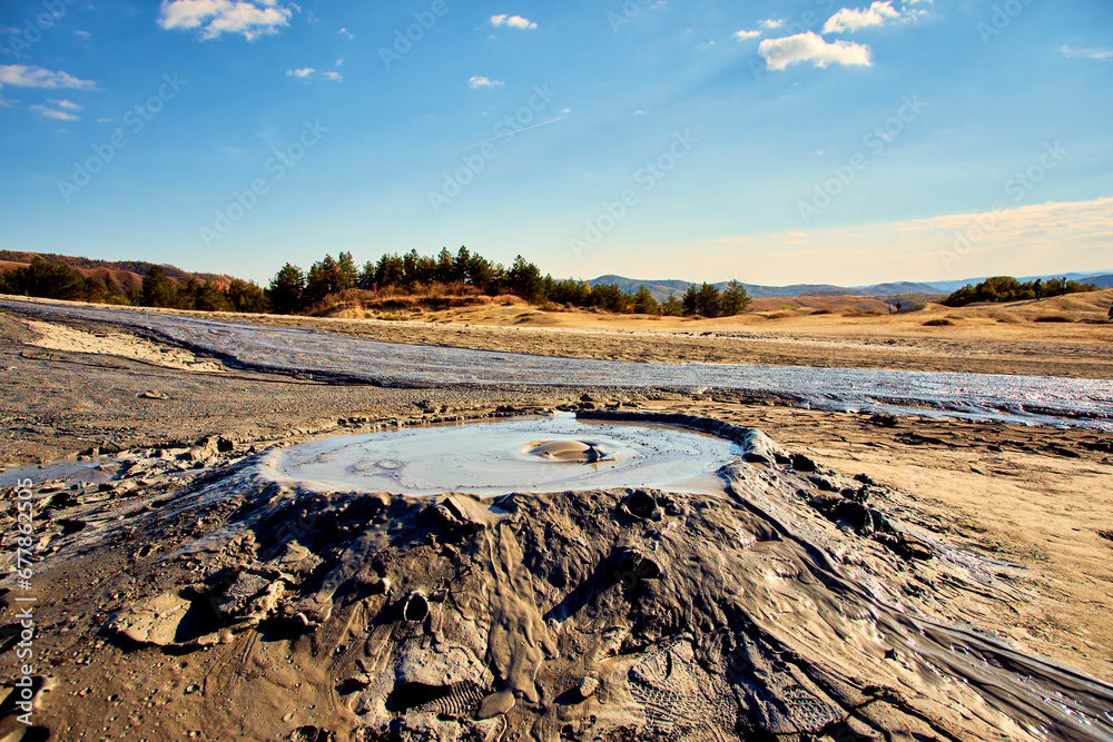 cones of mud volcanoes from which rivers of mud flow