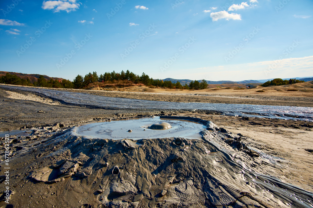 cones of mud volcanoes from which rivers of mud flow