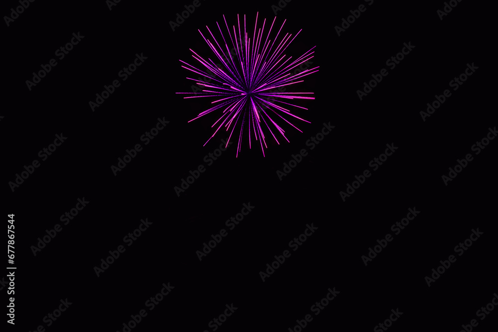 New Year's Night, Diwali, bonfire night Colourful Starbursts and Rocket Explosions on Black Background Sky with Red, Green, Blue, Purple, Gold Colour Fireworks Bursts with Space for Text-Smoke-free New Year's Night, Diwali, bonfire night Colourful Starbursts and Rocket Explosions on Black Background Sky with Red, Green, Blue, Purple, Gold Colour Fireworks Bursts with Space for Text-Smoke-free