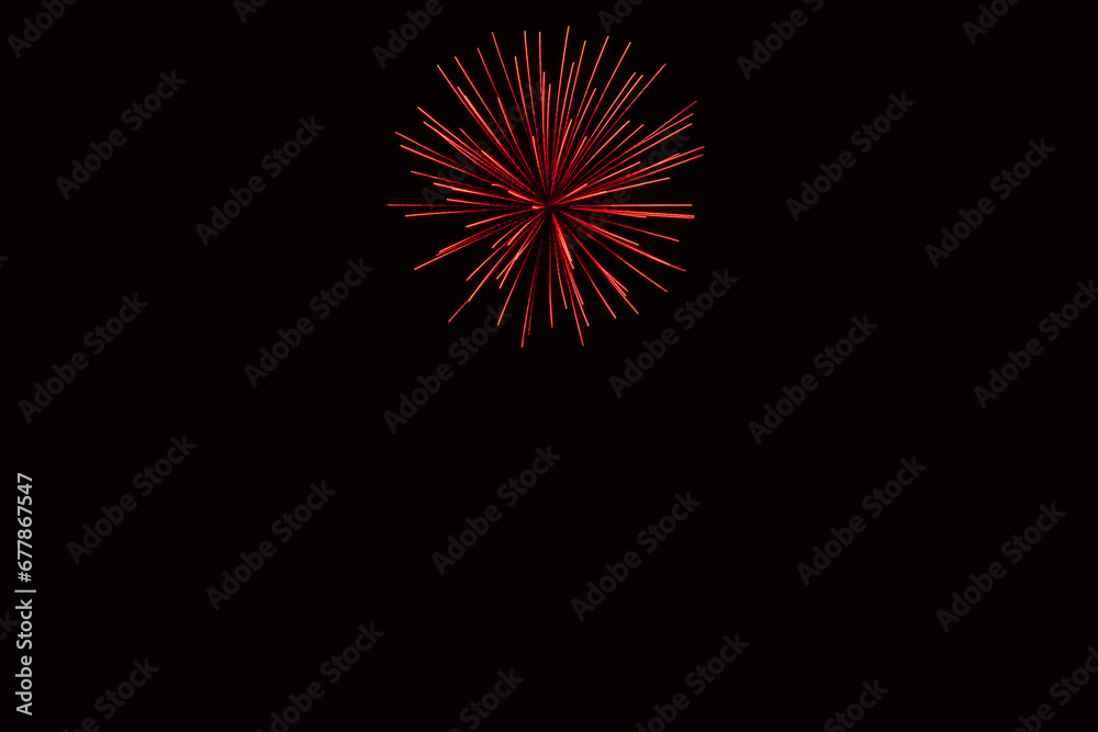 New Year's Night, Diwali, bonfire night Colourful Starbursts and Rocket Explosions on Black Background Sky with Red, Green, Blue, Purple, Gold Colour Fireworks Bursts with Space for Text-Smoke-free New Year's Night, Diwali, bonfire night Colourful Starbursts and Rocket Explosions on Black Background Sky with Red, Green, Blue, Purple, Gold Colour Fireworks Bursts with Space for Text-Smoke-free