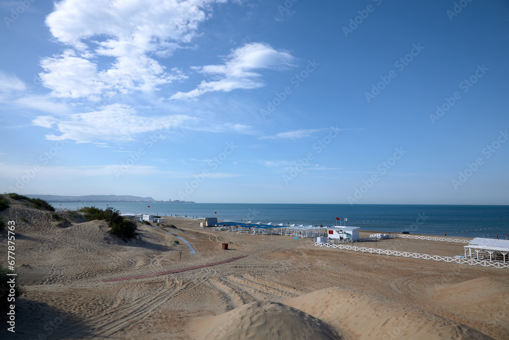 view of the blue black sea from the beach, summer, wind, creates drawings on the sand. lots of shells view of the blue black sea from the beach, summer, wind, creates drawings on the sand. lots of shells