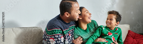 фотографія happy african american family in warm sweaters smiling happily at each other, Ch