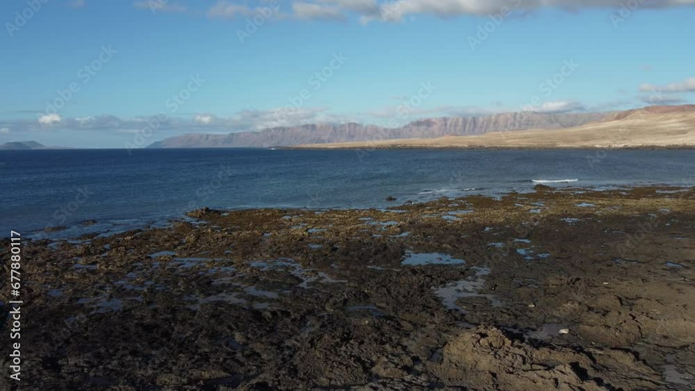 The ocean and beach in caleta the caballo, small town in lanzarote, canary island The ocean and beach in caleta the caballo, small town in lanzarote, canary island