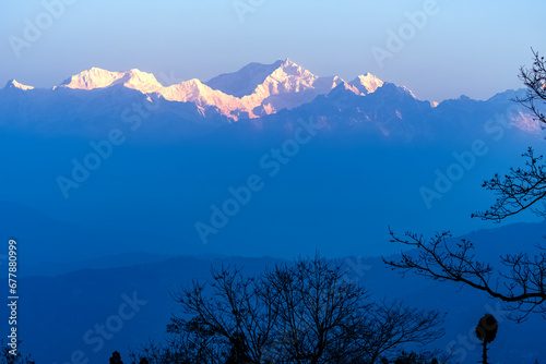 View of a foggy day at the top of the snow covered mountain range at Sikkim, India. photo