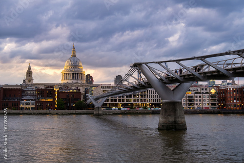 Millennium Bridge over River Thames leading to St Paul's Cathedral, London, England, UK photo