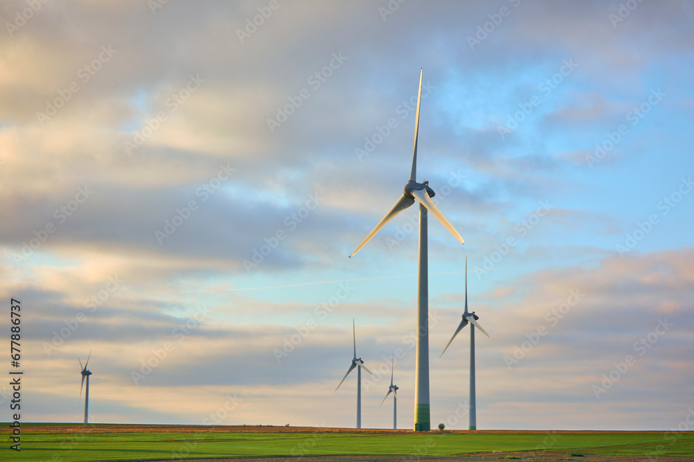 wind farm at sunrise in Romania