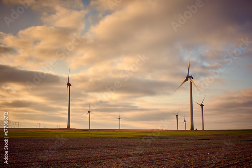 wind farm at sunrise in Romania