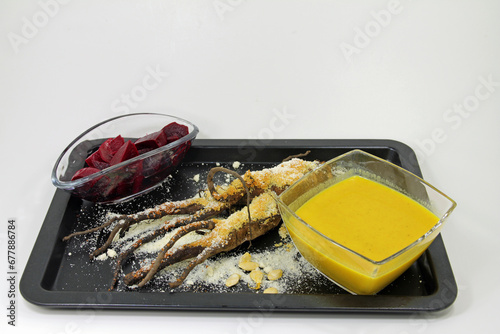 Healthy, vegan and tasty. beetroot salad, grilled oat root and hokaido pumpkin soup photo