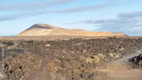 Fotografia The lava sea in in lanzarote, canaries, on the hike towards la caldera blanca, volcano desert