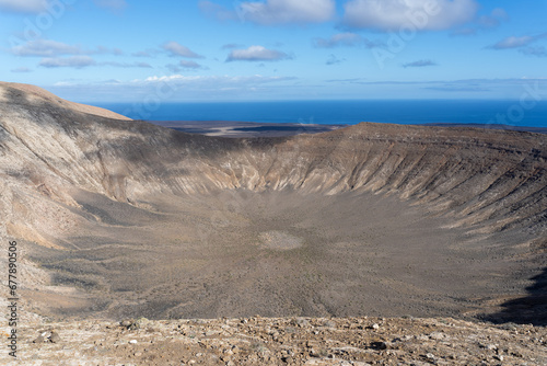 Lunar Volcanic landscape, Fire Mountains, volcanoes, crater of the Caldera Blanca volcano, Lanzarote, Canary Islands, Spain