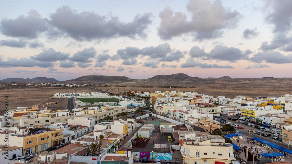 Panoramic view of El Cotillo bay, aerial high above point of view drone digital nomad night nightlife sunset sunrise dawn fuerteventura Spain