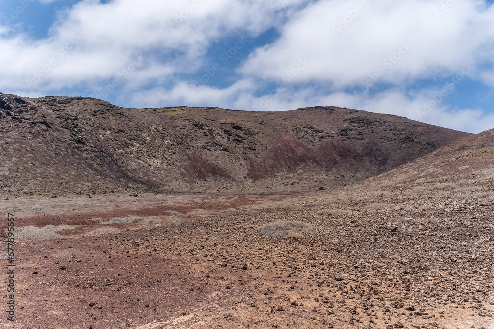 View of la Graciosa island close to lanzarote, canary island spain, with only dirt roads and old volcano View of la Graciosa island close to lanzarote, canary island spain, with only dirt roads and old volcano
