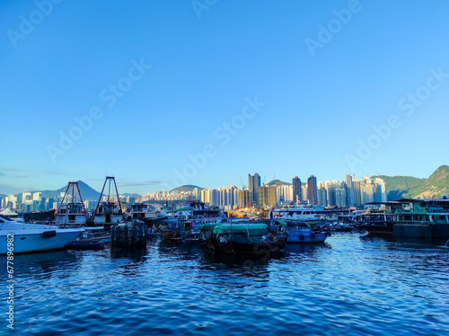 Ships dock at the Shau Kei Wan typhoon shelter harbor area, Hong Kong. photo