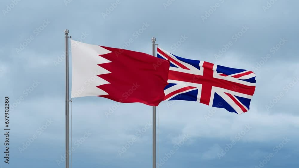 United Kingdom and Bahrain flag waving together on cloudy sky, endless seamless loop, two country cooperation concept United Kingdom and Bahrain flag waving together on cloudy sky, endless seamless loop, two country cooperation concept