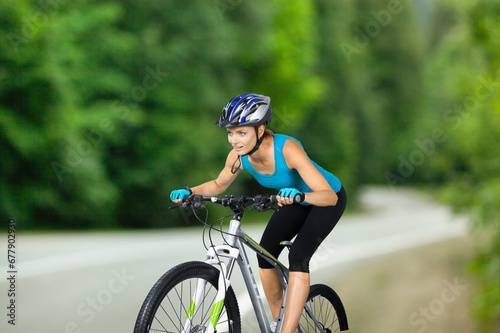 Cyclist sporty person riding bike outdoors