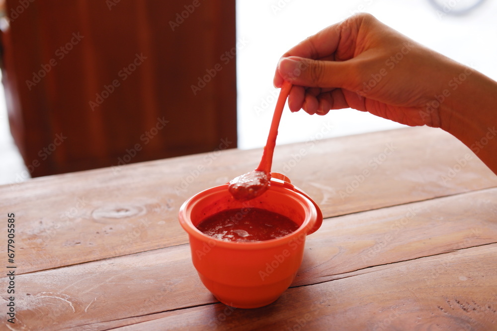 Indonesian traditional chili sauce served on bowl Indonesian traditional chili sauce served on bowl