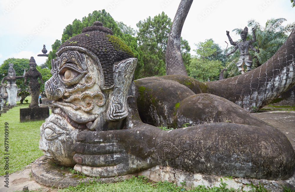 The stunning Buddha Park in Vientiane, Laos, home to numerous Buddhist and Hindu sculptures