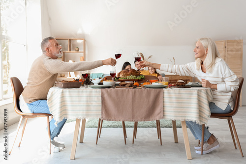 Mature couple having dinner...