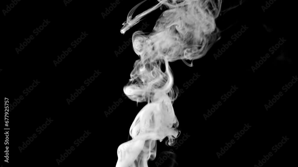 White smoke over a black background. This would work great as a background or as an element of a composite. White smoke over a black background. This would work great as a background or as an element of a composite.