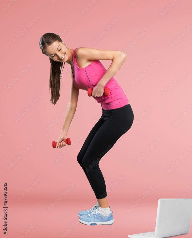 Smiling sportswoman doing exercise fitness Smiling sportswoman doing exercise fitness