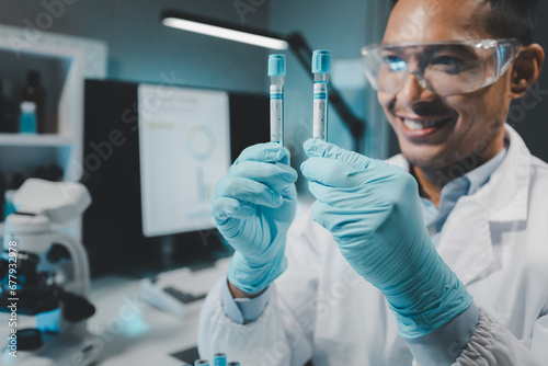 Chemist is chemically analyzing test tubes, Scientist is experimenting with chemicals in the laboratory, Chemist is separating compounds in test tubes with chemical reagents.