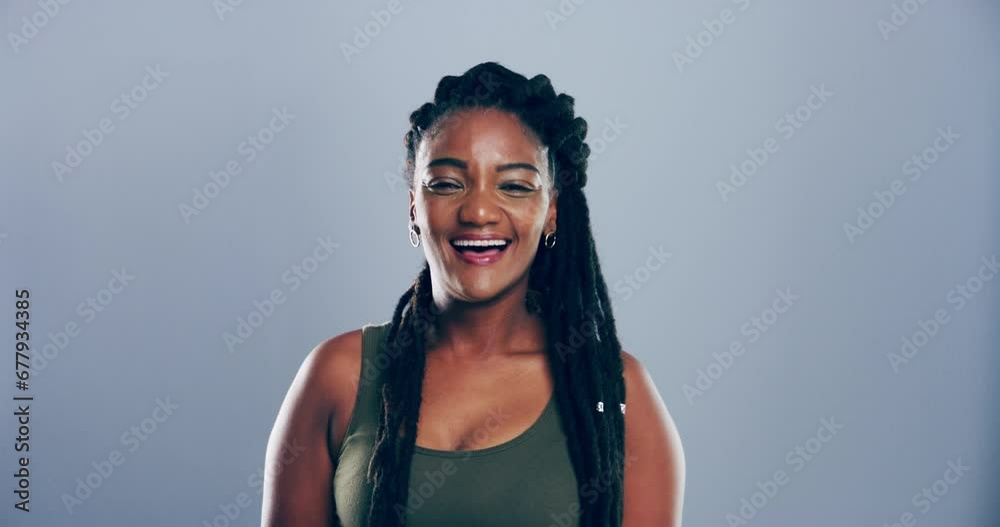 Smile, face and black woman thumbs up sign for thanks, yes or well done opinion, good luck or motivation. Studio portrait, okay feedback and Jamaican person with emoji icon on grey background