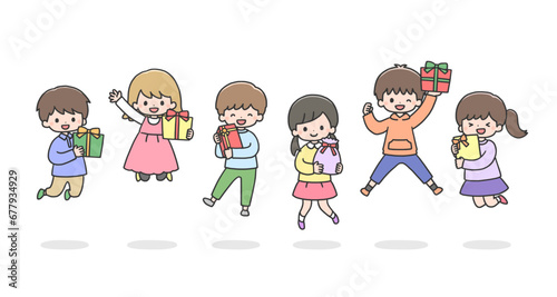プレゼントを持ってジャンプする笑顔の子どもたち