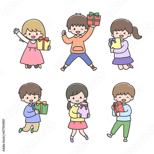 プレゼントを持ってジャンプする笑顔の子どもたち