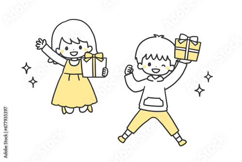 プレゼントを持ってジャンプする笑顔の子どもたち © 春田みつき