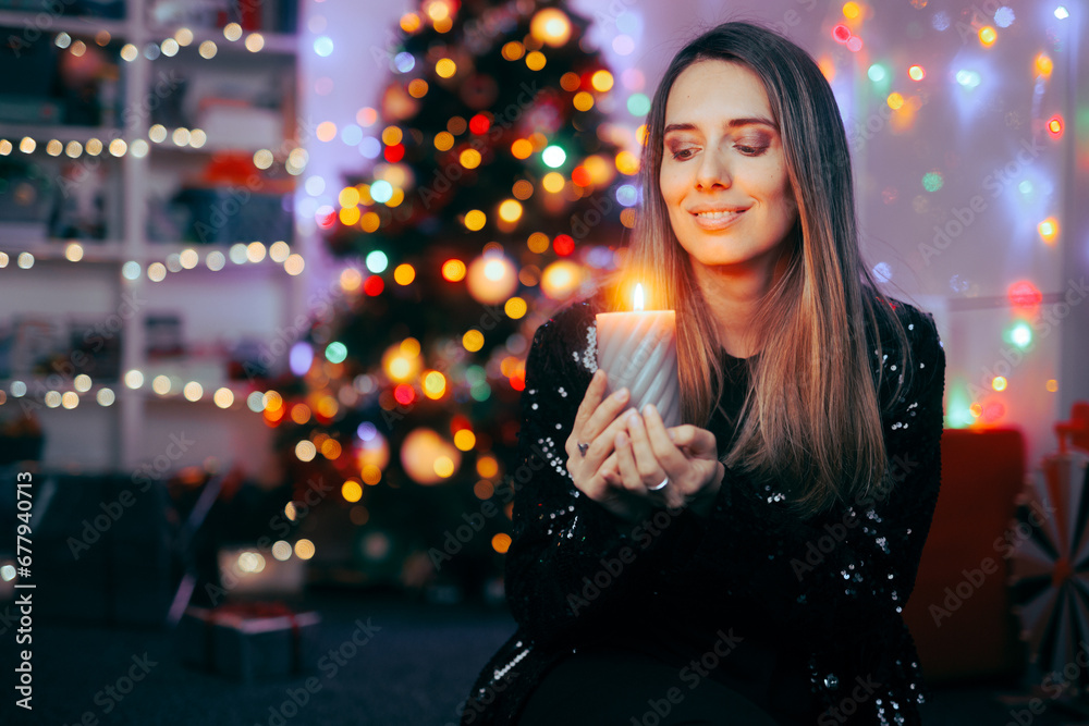 Happy Woman Holding a Candle Celebrating Christmas at Home. Adult person feeling festive enjoying holiday atmosphere
Happy Woman Holding a Candle Celebrating Christmas at Home. Adult person feeling festive enjoying holiday atmosphere
