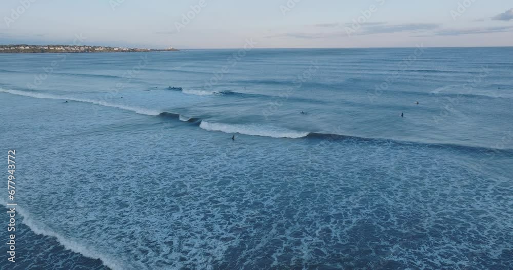 Aerial Drone shot of York Long Sands Beach Maine surf with surfers and waves late afternoon Aerial Drone shot of York Long Sands Beach Maine surf with surfers and waves late afternoon