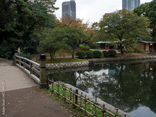 Pond in autumn Hamarikyu Gardens in Tokyo Japan