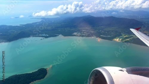 Wallpaper Mural Plane flying over Chiangmai Chiang Mai city on way to airport passing by clouds and mountains in Thailand  Torontodigital.ca