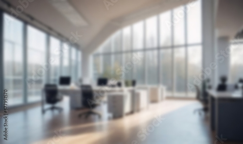 Beautiful blurred background of a light modern office interior with panoramic windows and beautiful lighting