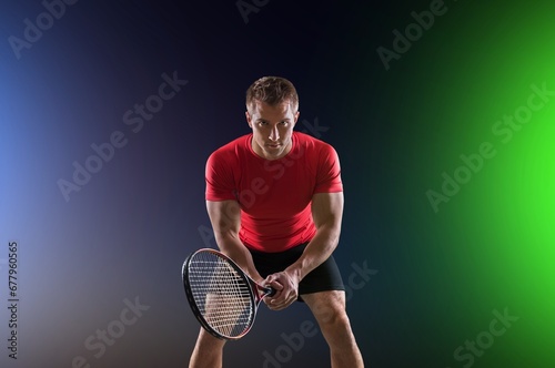 Young Tennis Player hold Racket in Hand. © BillionPhotos.com