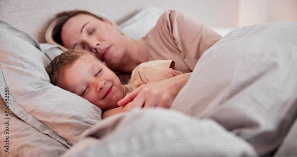 Home, bed and mother with boy, sleeping and family with love, peace and security with trust. Apartment, relax and child embrace, parent or freedom with rest, weekend and comfort with care and blanket Home, bed and mother with boy, sleeping and family with love, peace and security with trust. Apartment, relax and child embrace, parent or freedom with rest, weekend and comfort with care and blanket
