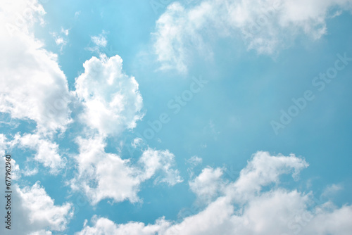 Light blue sky and white clouds. With copy space.