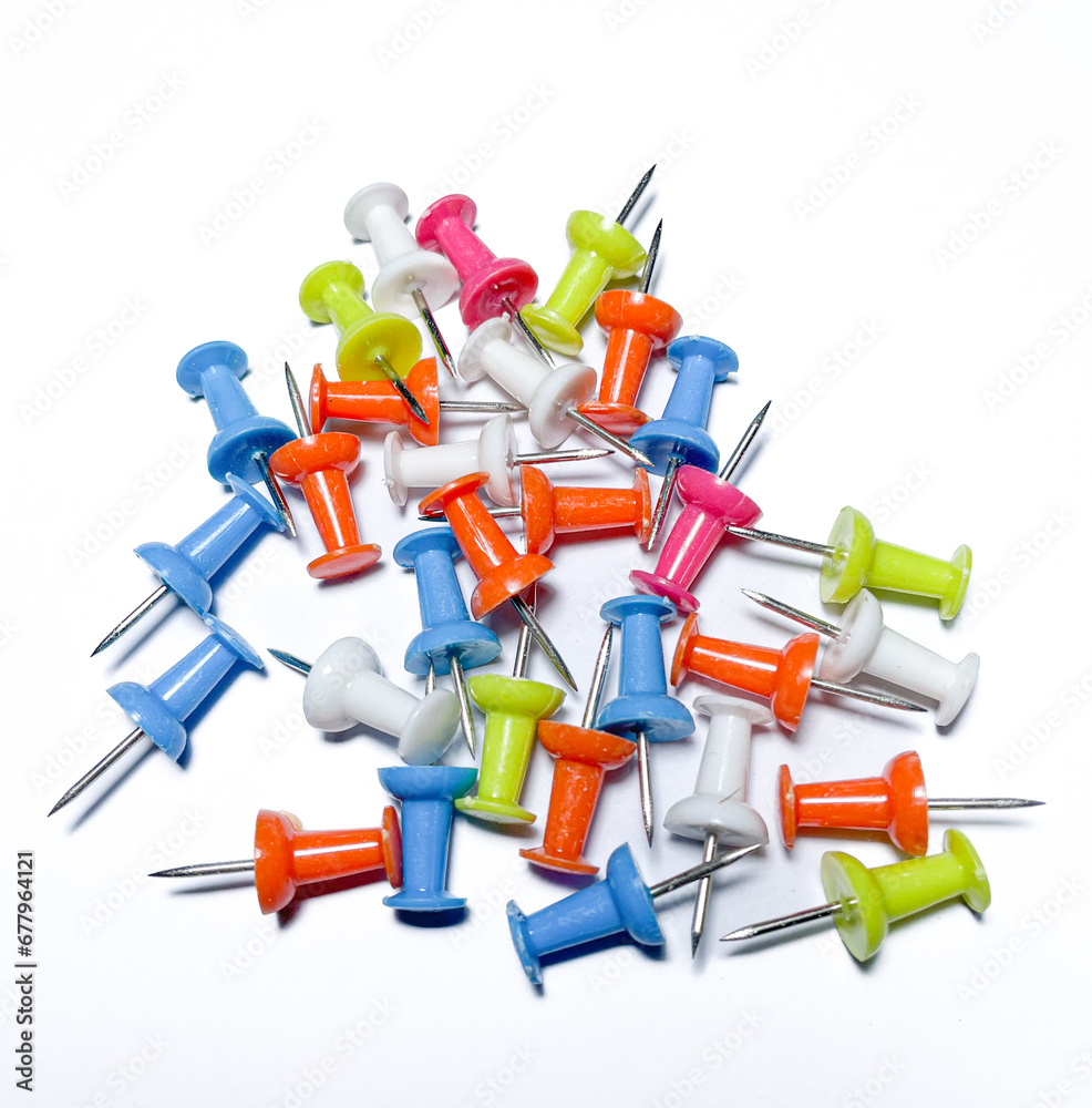 heap of push pins isolated on white background heap of push pins isolated on white background