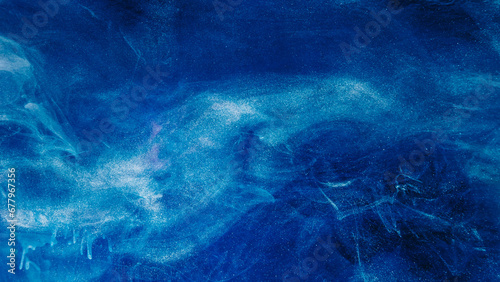 Smoke cloud background. Mysterious sky. Blue glitter ink abstract magic heaven air flow spreading in shimmering water hypnotic creativity art.