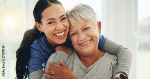 Happy woman, nurse and hug senior patient in elderly care, support or trust at old age home. Portrait of mature female person, doctor or medical caregiver hugging with smile for embrace at house photo