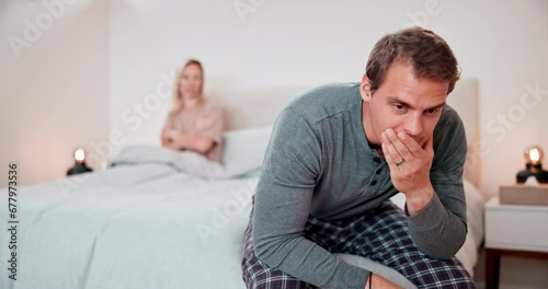 Man, stress and conflict of couple in bedroom for sad, breakup and mistake at home. Crisis, divorce and frustrated partner thinking about cheating, marriage affair and toxic fight for emotional drama photo