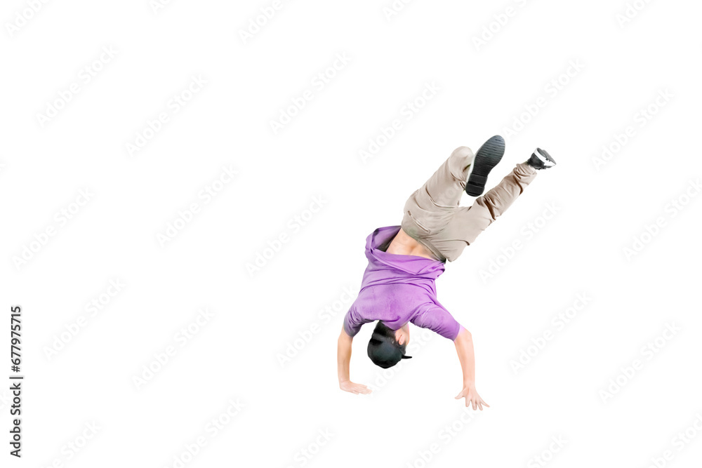 Fototapeta premium Young guy wearing hat doing some break dancing