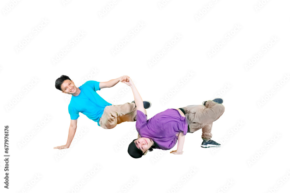 Young male asian guys doing some break dancing isolated on white Young male asian guys doing some break dancing isolated on white