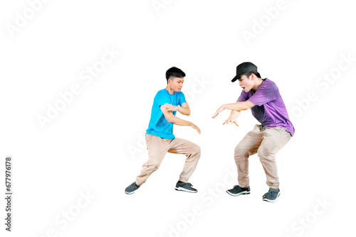 Young male asian guys doing some break dancing isolated on white