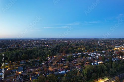 Beautiful High Angle Footage of Illuminated Central Letchworth Garden City of England UK. The Footage Captured with Drone's Camera on November 11th, 2023 at Just After Sunset and During Night