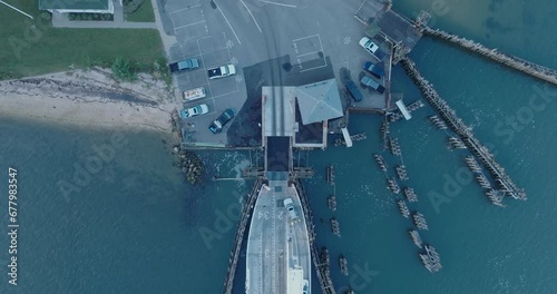 Top Down Aerial Drone shot of Ferry unloading to Shelter Island North Fork Long Island New York before sunrise photo