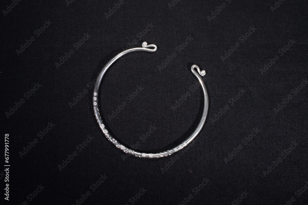 Hmong silver jewelry on black background, Handmade silver accessories Hmong silver jewelry on black background, Handmade silver accessories