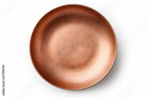 Empty copper frying pan on the kitchen. Top view photo